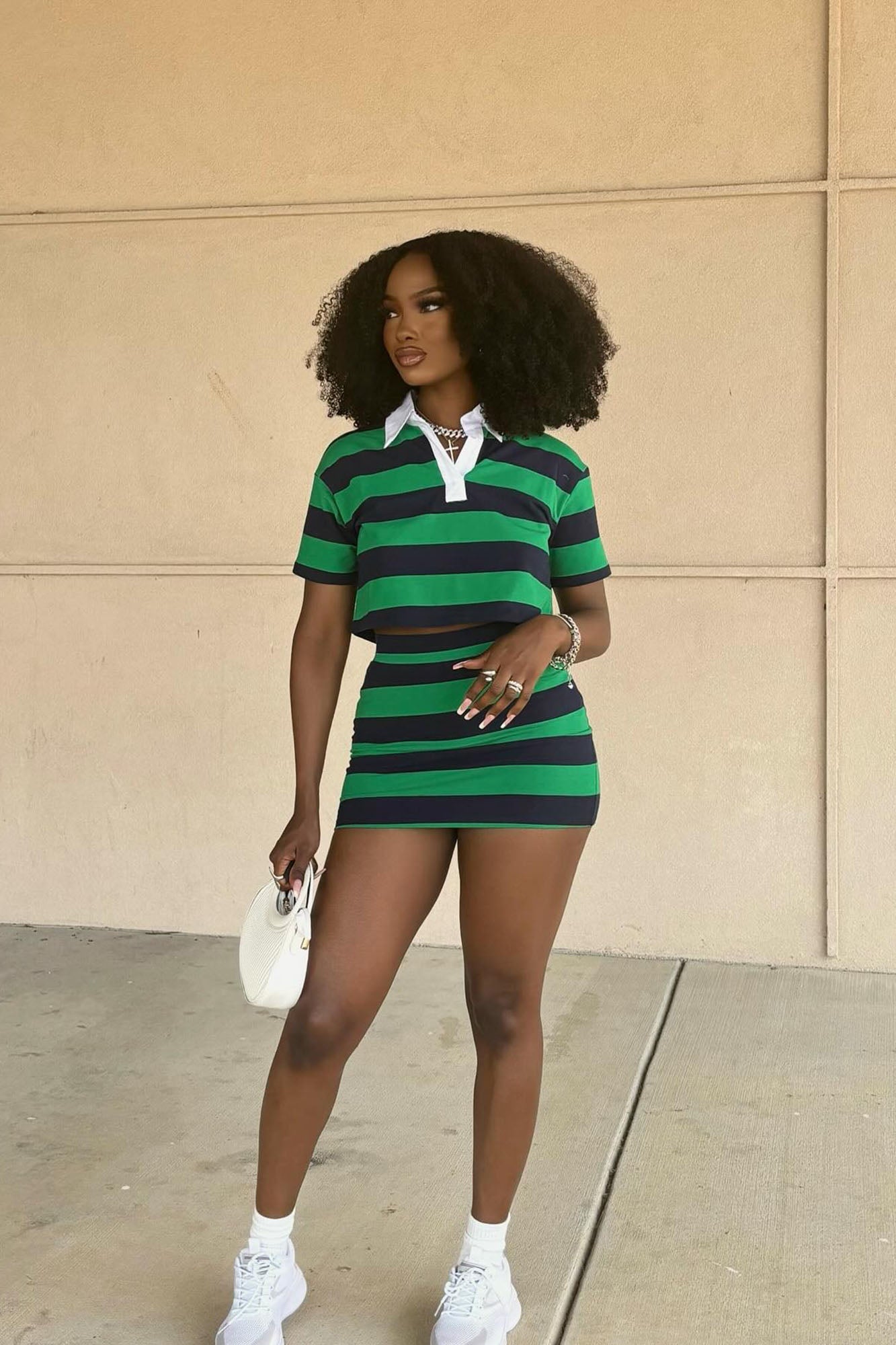 https://cdn.shopify.com/s/files/1/0293/9277/files/8-5-2024__051_Lindsay_Striped_Polo_Skirt_Set_Hunter_LA.jpg?v=1723589139
